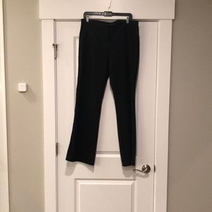 Wool tuxedo pants with lace detail.